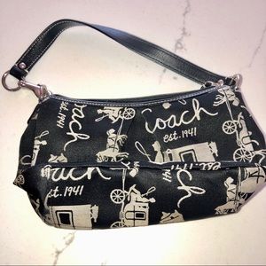 Coach small black handbag. Stage Coach design